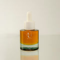 "Nectar of Youth Face Oil bottle - lightweight anti-aging facial serum"